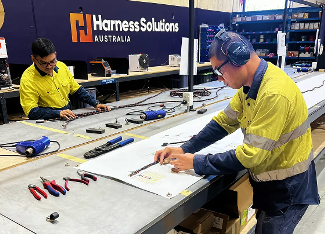 HSA technician working at the harness bench